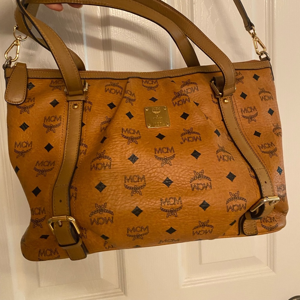 MCM Boston Cognac with adjustable crossbody. Size 15 x 11 x 6